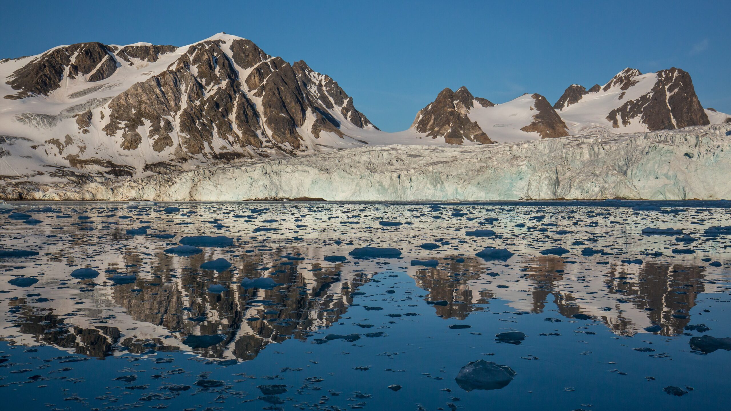 Glacier and fjord at Fair Haven in evening light, Svalbard